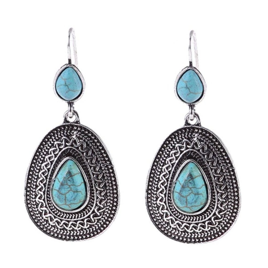 Earring With Turquoise Tear Drops And Silver Plate.